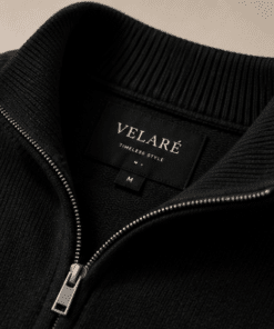 VELARÉ VELARÉ Black Merino Quarter-Zip — collar and brand label detail, luxury menswear