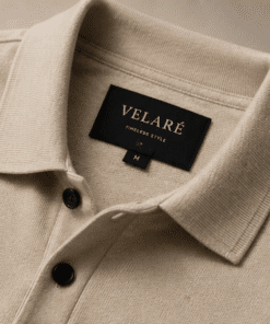 VELARÉ VELARÉ Sand Knit Polo — collar and brand label detail, luxury menswear